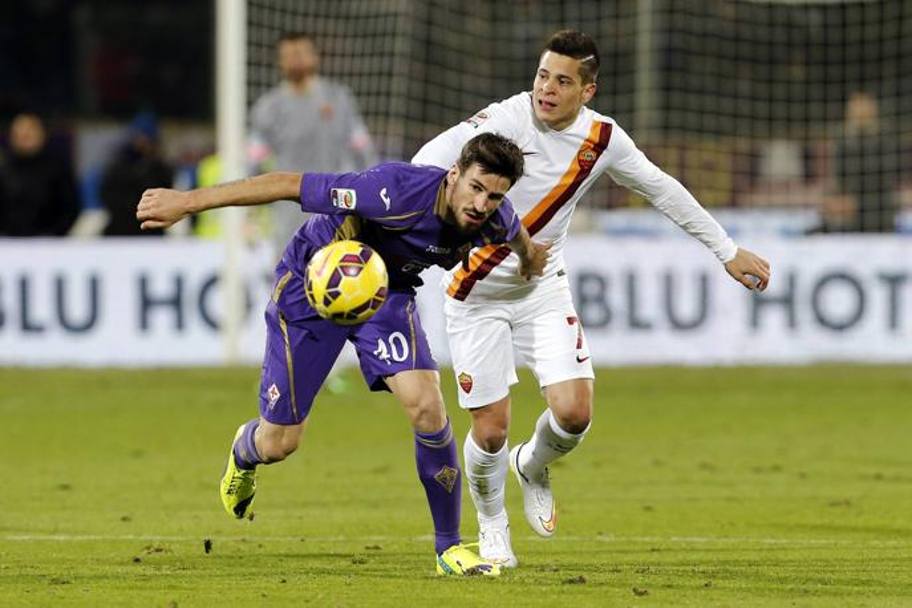 Tomovic contro Iturbe. Action Images